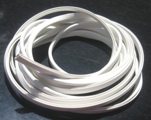 White Rubber Trim, Flexible PVC W/ Aluminum Inner Clip, 1/8" X 9/16" Wide X 25' Long